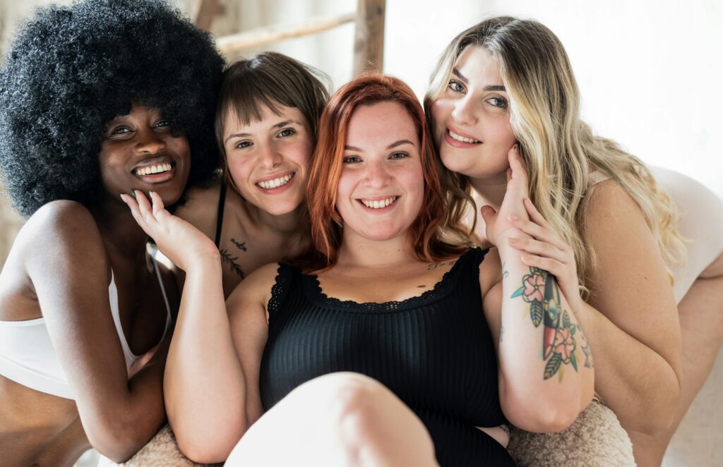 Group of young women having fun and looking at camera.